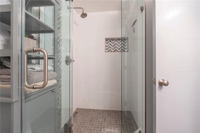 bathroom with an enclosed shower