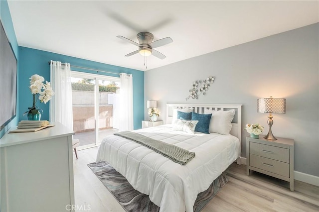 bedroom with access to outside, ceiling fan, and light hardwood / wood-style flooring