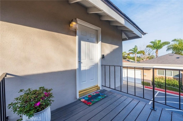 entrance to property with a balcony