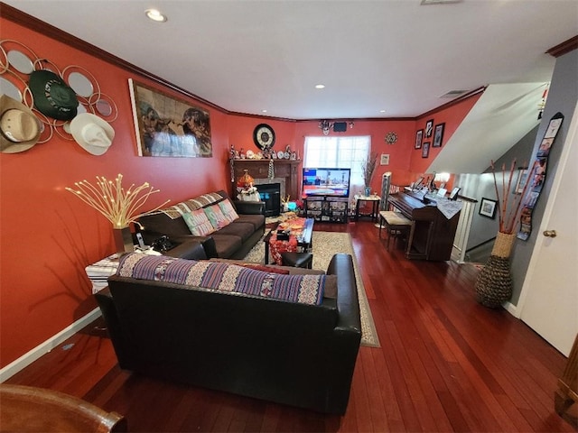 living room featuring crown molding and dark hardwood / wood-style flooring