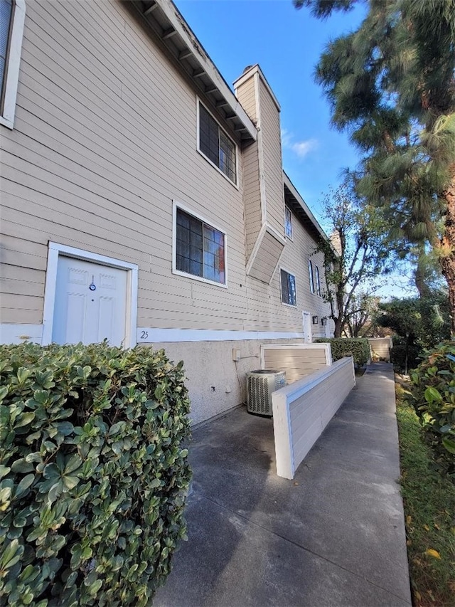 8338 Woodley Pl Unit 25, North Hills, CA 91343 - view of home's exterior featuring a patio area