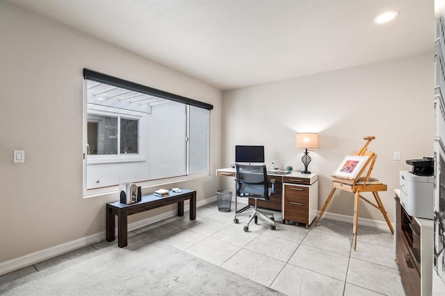 office area featuring light tile patterned flooring