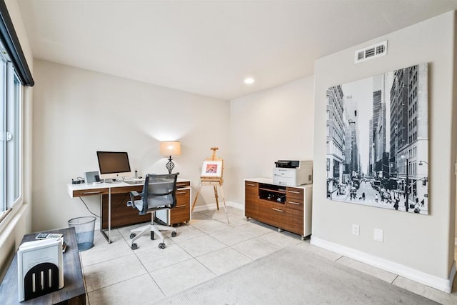 home office with light tile patterned floors