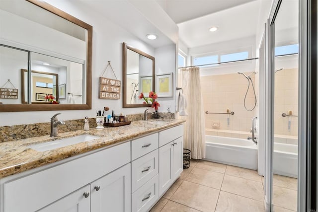 bathroom with tile patterned floors, vanity, and shower / bath combo