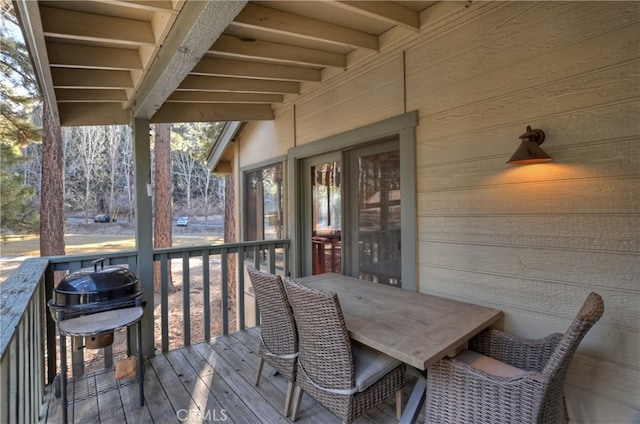 wooden terrace featuring area for grilling