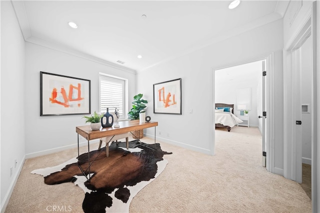 office space featuring crown molding and light colored carpet