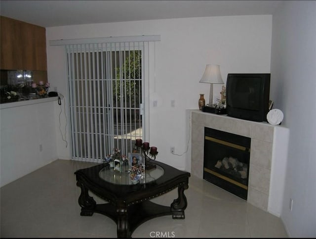 living room featuring a fireplace