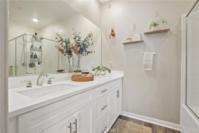 bathroom with vanity and hardwood / wood-style floors