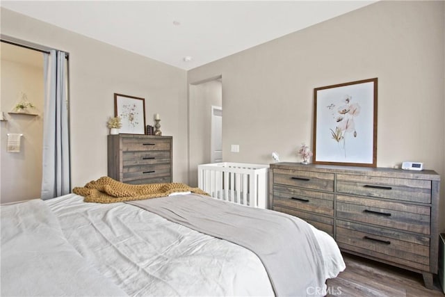 bedroom with wood-type flooring