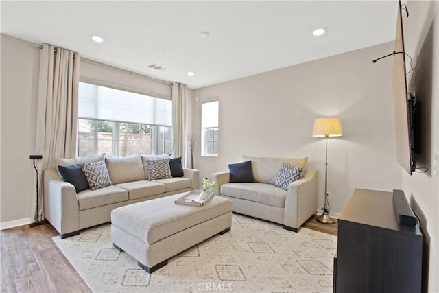 living room with light wood-type flooring