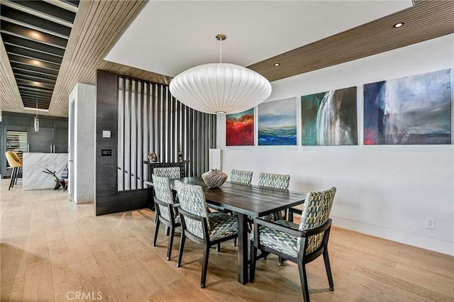 dining room with light hardwood / wood-style flooring