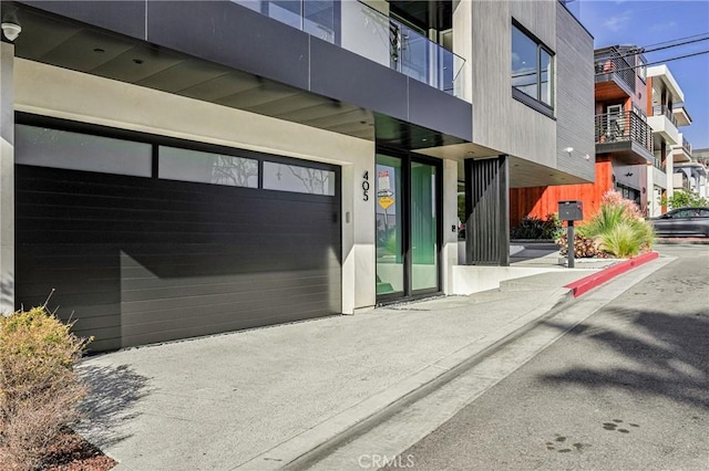 405 26th St, Manhattan Beach, CA 90266 - property entrance featuring an attached garage