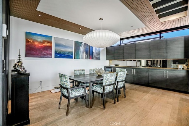 dining room with light hardwood / wood-style floors