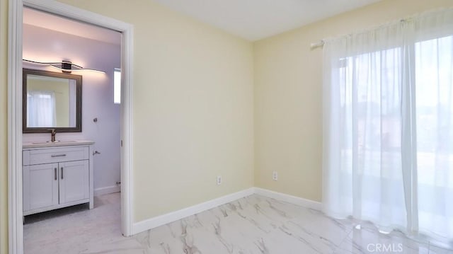 spare room featuring sink