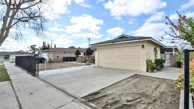 view of side of property with a garage