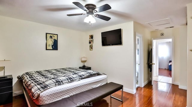 bedroom featuring dark wood-type flooring and ceiling fan