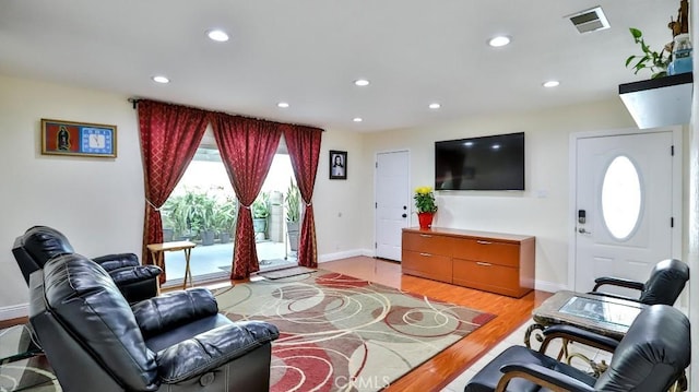 living room featuring light wood-type flooring