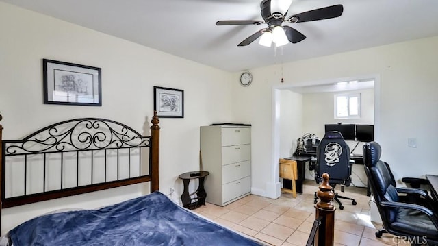 bedroom featuring light tile patterned floors and ceiling fan