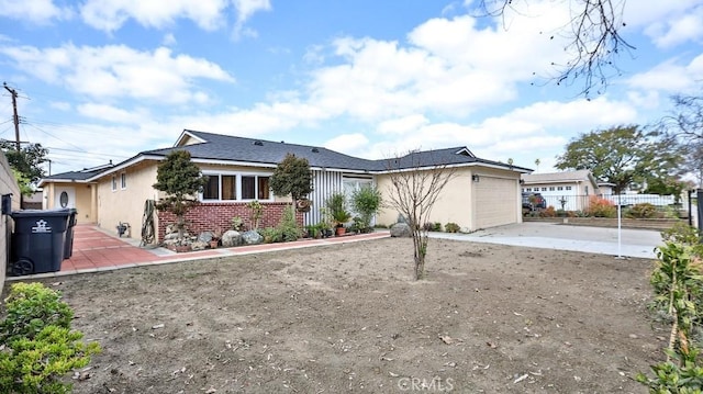 ranch-style home with a garage