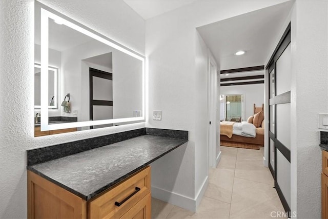 bathroom featuring tile patterned flooring