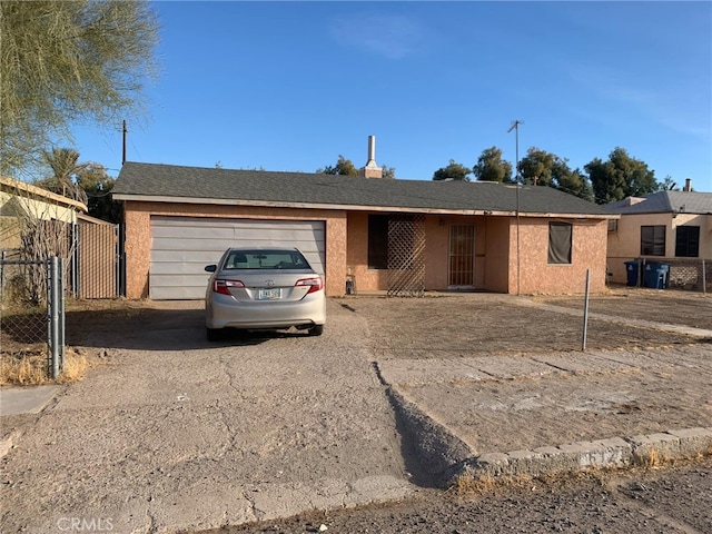 ranch-style house with a garage