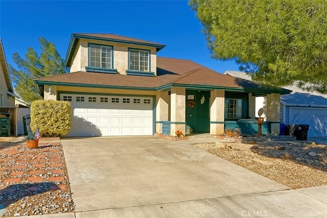 view of front of property with a garage