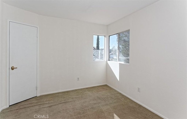 view of carpeted spare room