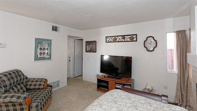 bedroom with light carpet and multiple windows