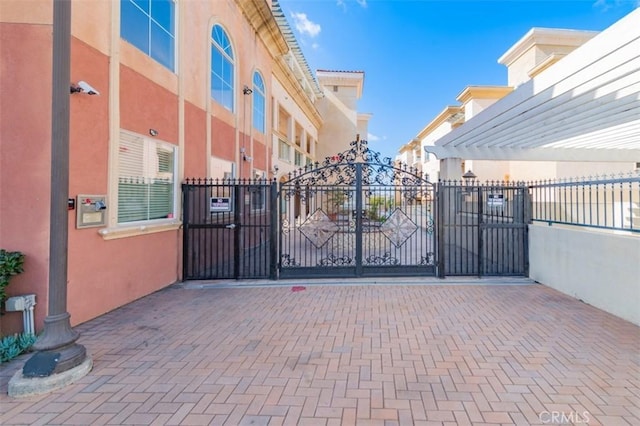 view of gate with a pergola