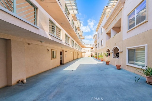 surrounding community with a patio area