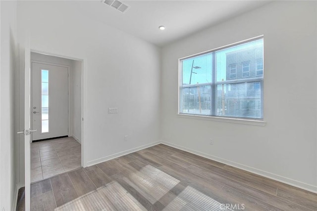 empty room featuring light wood-type flooring