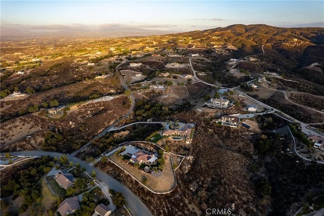 drone / aerial view featuring a mountain view