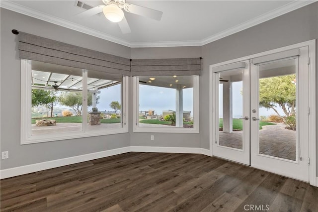 unfurnished sunroom with french doors and a ceiling fan