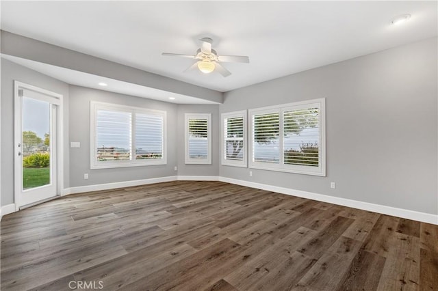 interior space featuring ceiling fan, recessed lighting, wood finished floors, and baseboards