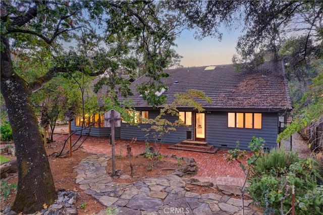 view of front of property featuring a patio area