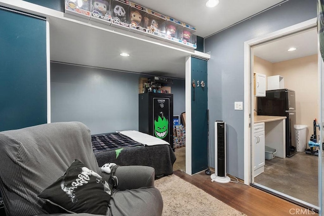 bedroom with refrigerator