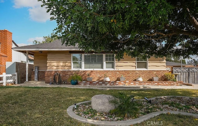 exterior space featuring a front lawn