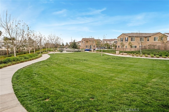 surrounding community featuring a lawn