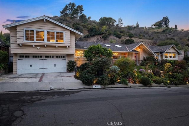 front of property featuring a garage