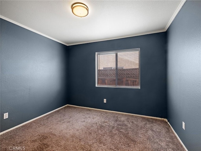 carpeted empty room featuring crown molding