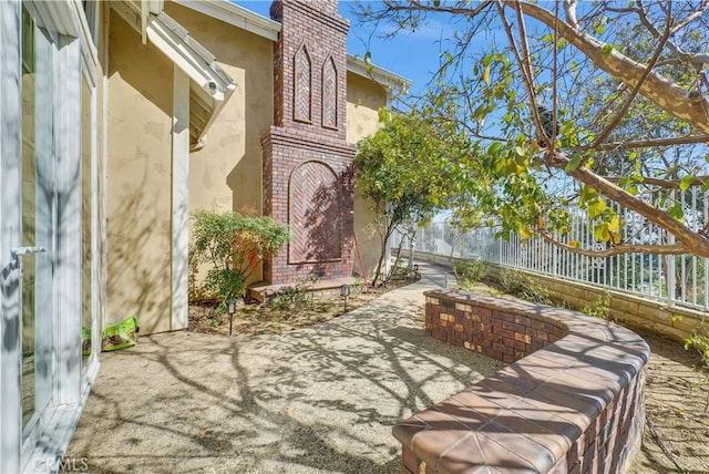 view of patio with fence