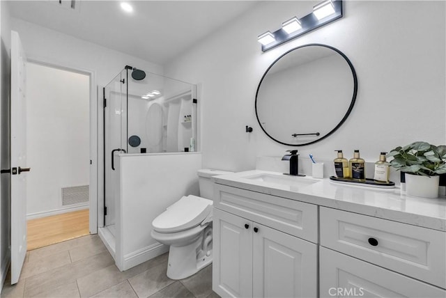 full bath with a stall shower, visible vents, toilet, tile patterned flooring, and vanity