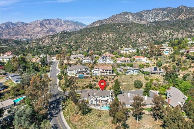 bird's eye view with a residential view and a mountain view