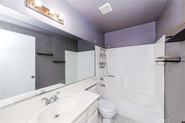 full bathroom featuring shower / tub combination, vanity, and toilet