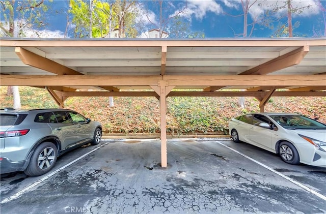 view of car parking featuring a carport