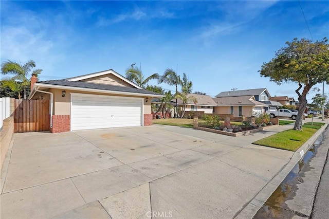 ranch-style home featuring a garage