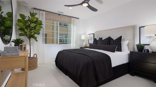 carpeted bedroom featuring ceiling fan