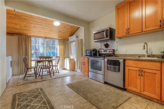 17193 Manzanita St, Stirling City, CA 95978 - kitchen featuring brown cabinetry, wooden ceiling, appliances with stainless steel finishes, a sink, and light tile patterned flooring