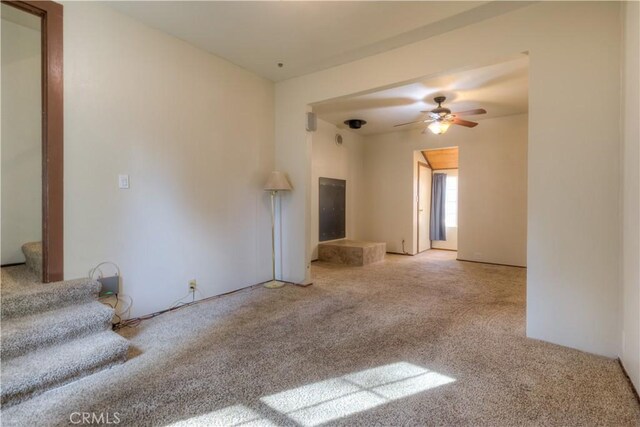 17193 Manzanita St, Stirling City, CA 95978 - unfurnished living room featuring stairway, carpet flooring, and a ceiling fan