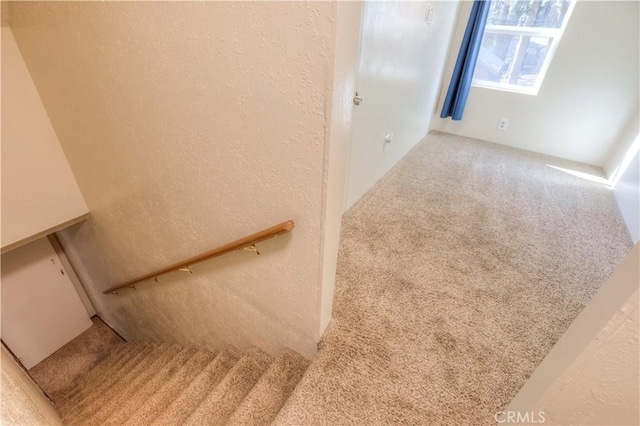 17193 Manzanita St, Stirling City, CA 95978 - staircase featuring carpet flooring and a textured wall